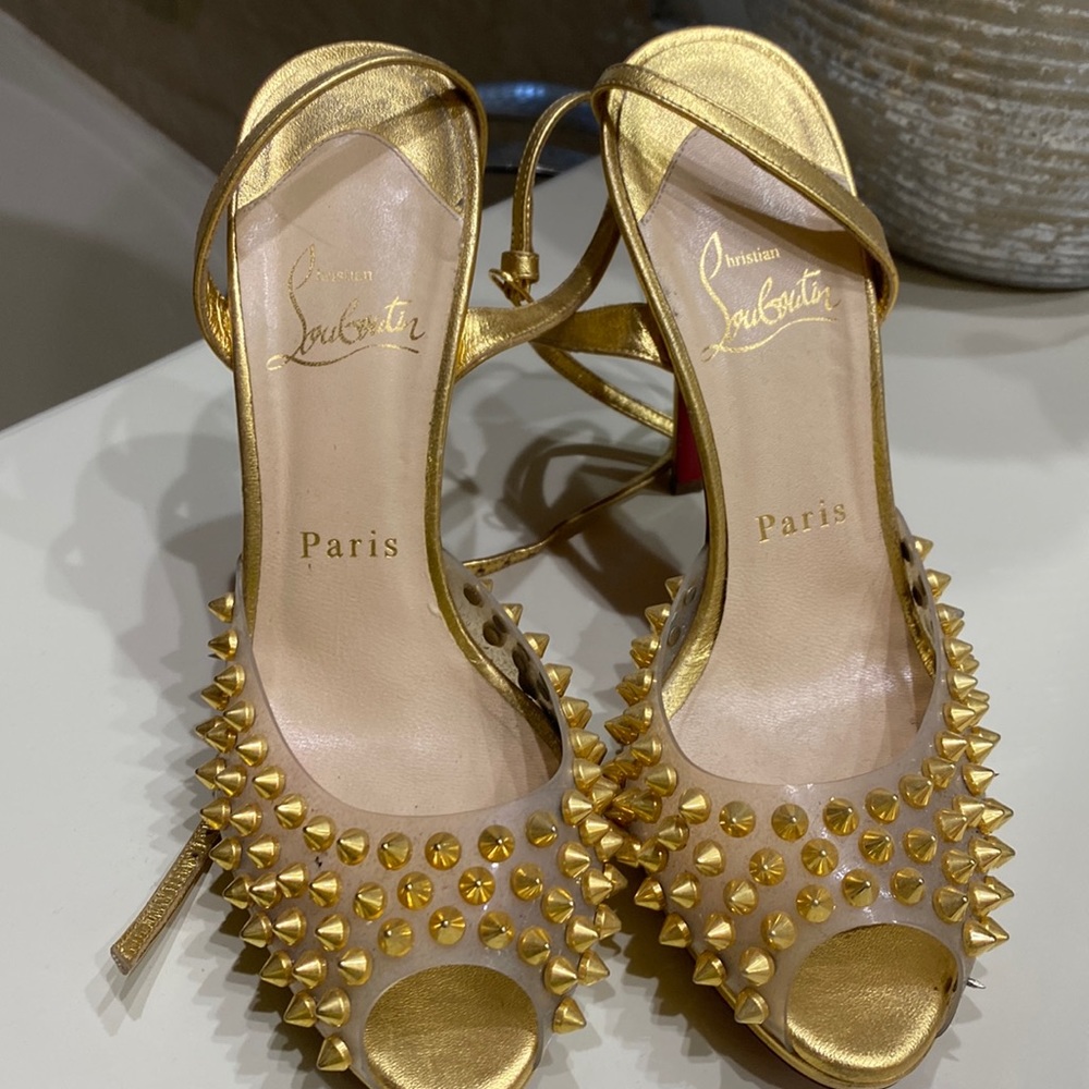 Christian Louboutin Size 36 or 6 woman gold studded minor wear tear